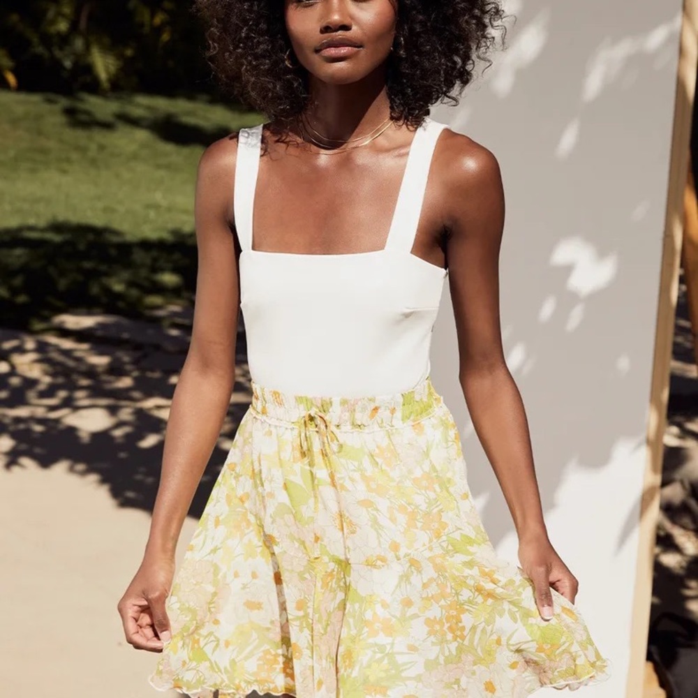 Lulu’s Symbolize White Sleeveless Bodysuit